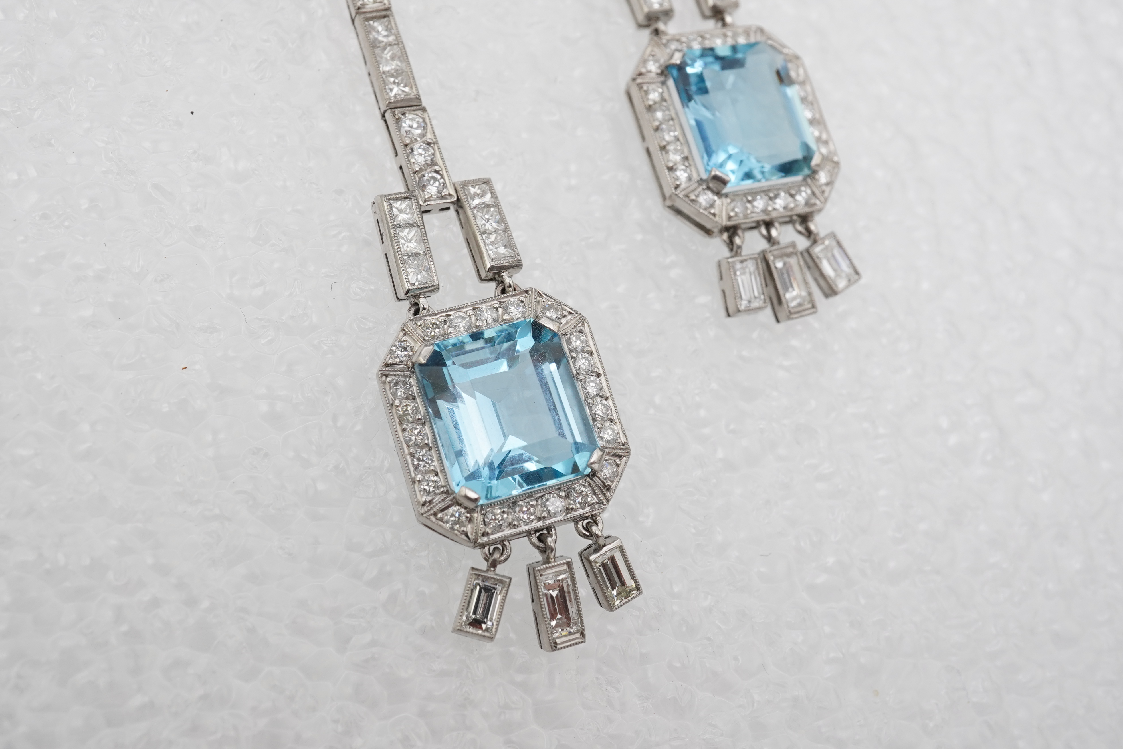 An attractive pair of aquamarine and diamond earrings